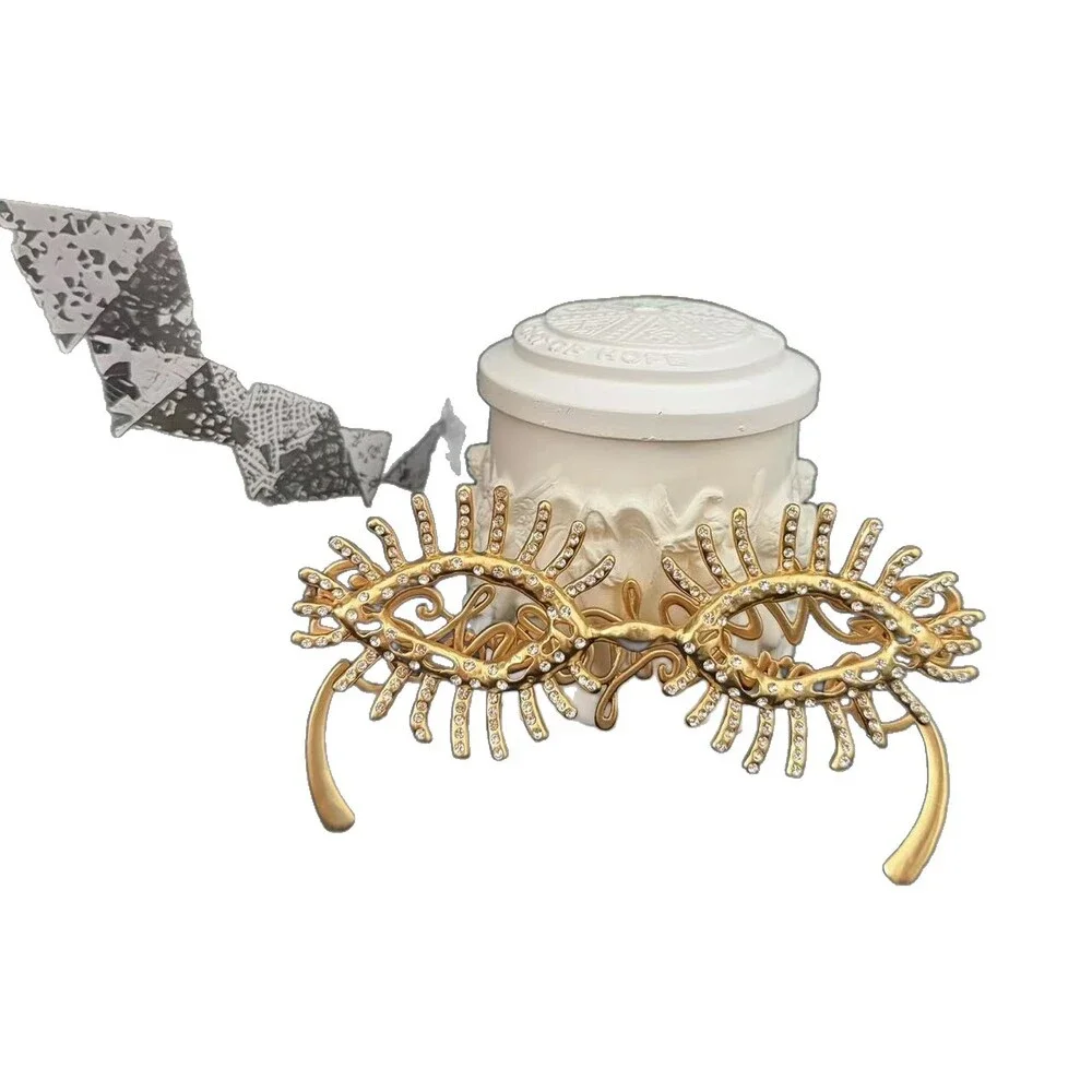Schiaparelli's extravagant art glasses with numerous diamonds